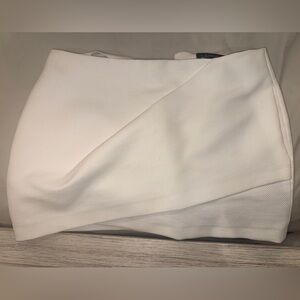 White mini skirt
